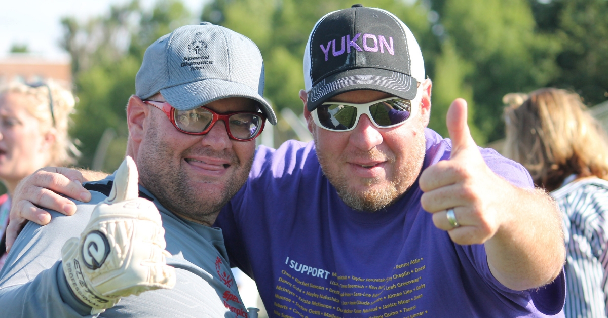 Gaetan gives the thumbs up with his brother Serge.