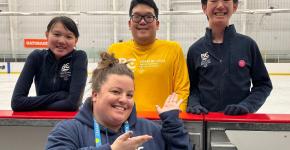Coach Jessica Chapelski with three athletes