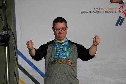 Athlete on Podium; Medals; Powerlifting