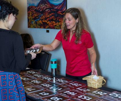 Person volunteering at the Special Olympics Yukon Festival Dinner Auction