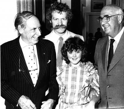 Harry Red Foster with NHL player Lanny McDonald and an athlete.