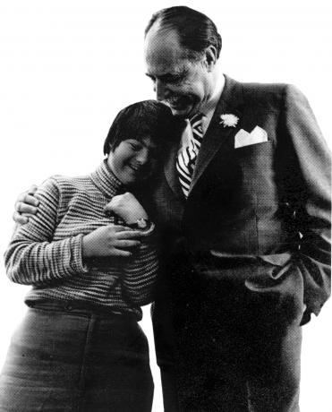 Harry Red Foster with an athlete.