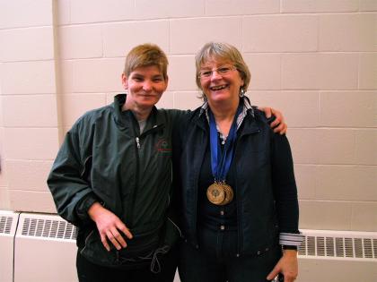 Patti Connors stands with her arm around her coach Evelyn Kitchen.