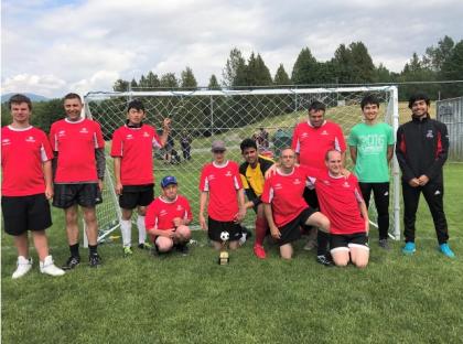 Roshan Gosal with his Special Olympics B.C. soccer team.