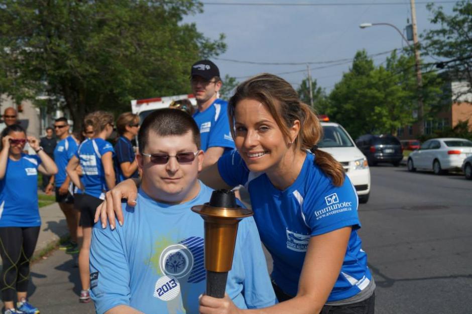 Annie with a Special Olympics athlete.