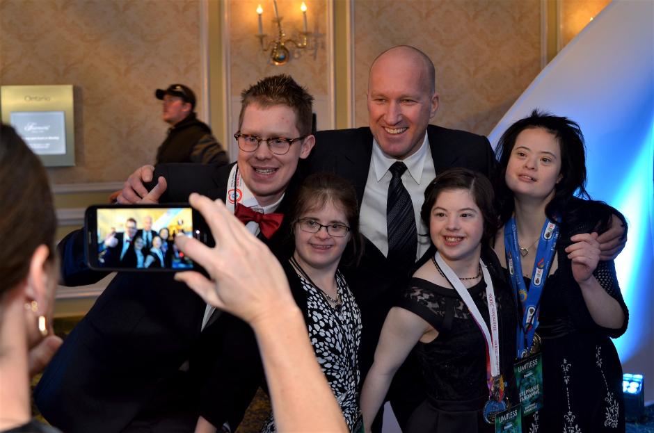 Canadian skier Brian Stemmle poses for a photo with Special Olympics athletes at LIMITLESS 2017.