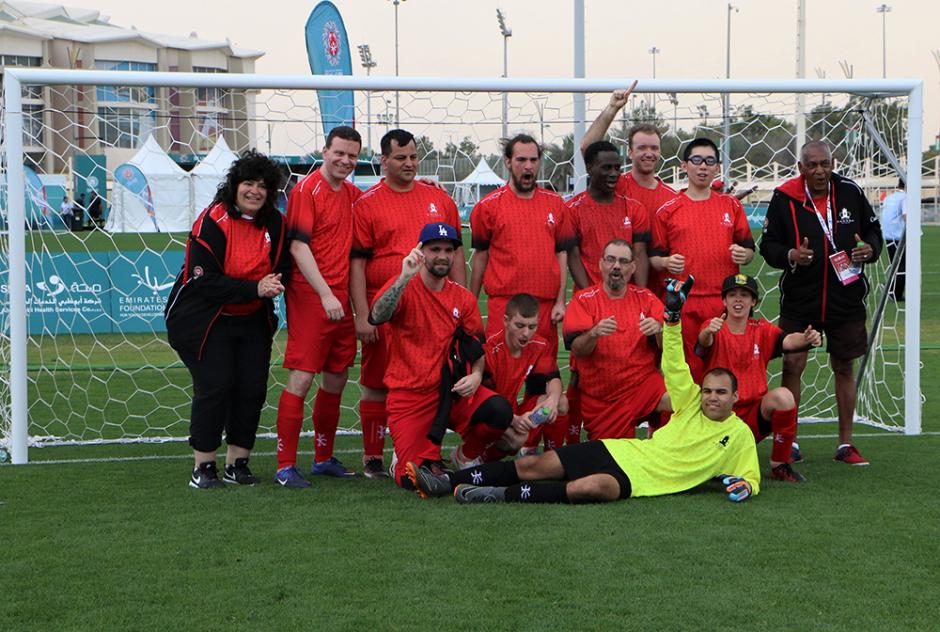 SO Team Canada's soccer team poses for a photo after their first win at World Games.