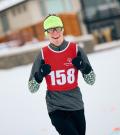 Torben smiling with thumbs up wearing his snowshoeing gear