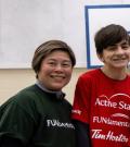 Phoebe smiling with SOBC youth participant