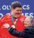 Patricia and her silver medalist counter-part on the podium at the 2023 Special Olympic World Games in Berlin.