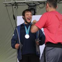 Team Alberta Powerlifter, David Nicholson receiving his silver medal