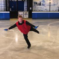 Special Olympics Ontario athlete Tim Goodacre skates on the ice.