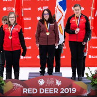 Melanie stands on the first place podium at Canada Games