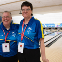 Fae and Jeri Lee Hodgins pose for a photo at the bowling alley.