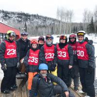Martin McSween poses for a photo with his ski team.
