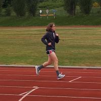 Athlete Miranda Orth running on a track