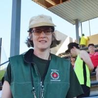 Miranda Orth standing in the grandstand smiling