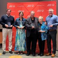 SOBC Hall of Fame inductees holding their awards and smiling