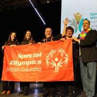 Prince George representatives with SOBC athlete and Jan Antons holding up SOBC banner