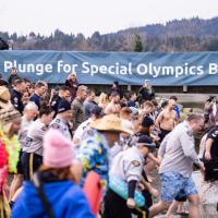 Plungers running into chilly waters