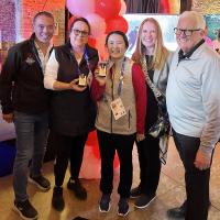 Special Olympics Directors and Dan Howe standing together