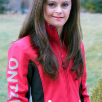 "Alicia Smith smiles looking into the camera."