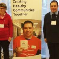 Special Olympics BC athletes Robyn and Vincent at Inclusive Health meeting.