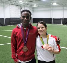 Soccer player Eddie Nicks with Diana Matheson