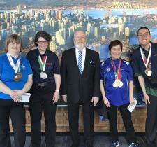 Special Olympics BC – Vancouver athletes with New Car Dealers Association of BC Chairman Jeff Hall 