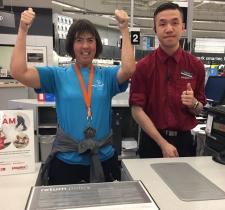 Thumbs up for Give a Toonie Share a Dream at the Staples store in Coquitlam. 