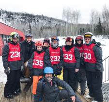 Martin McSween poses for a photo with his ski team.