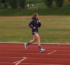 Athlete Miranda Orth running on a track