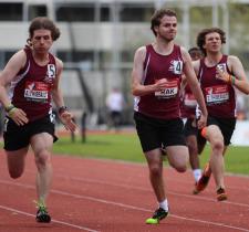 Athletes Jesse, Thomas, and Zak in a track race