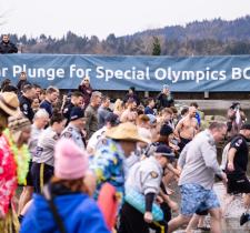 Plungers running into chilly waters