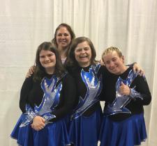 Jennifer Fyfe with three of her rhythmic gymnastics athletes