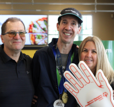 Special Olympics athlete Brent Shipton with Sobeys store owners, Dave and Deb Lukawenko.
