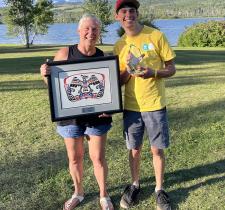 Gale Jones and Torben Schuffert holding their SOBC awards