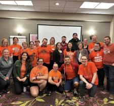 Canadian Athlete Input Council group photo, all wearing orange shirts