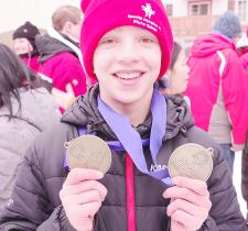 Yorke holding two medals at the 2023 SOBC Winter Games