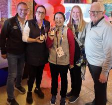 Special Olympics Directors and Dan Howe standing together