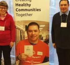 Special Olympics BC athletes Robyn and Vincent at Inclusive Health meeting.