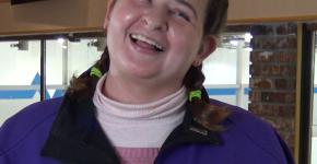 Athlete Bridget smiling at a curling practice