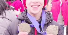 Yorke holding two medals at the 2023 SOBC Winter Games