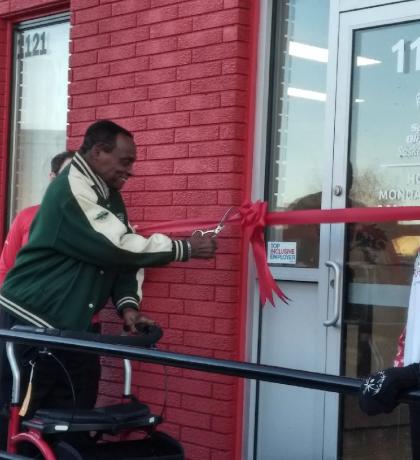 George Cutting the ribbon