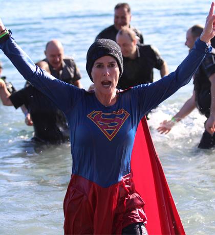 Oak Bay Police Department Constable Sheri Lucas takes the Plunge at Willows Beach.