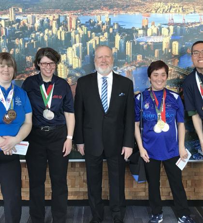 Special Olympics BC – Vancouver athletes with New Car Dealers Association of BC Chairman Jeff Hall 
