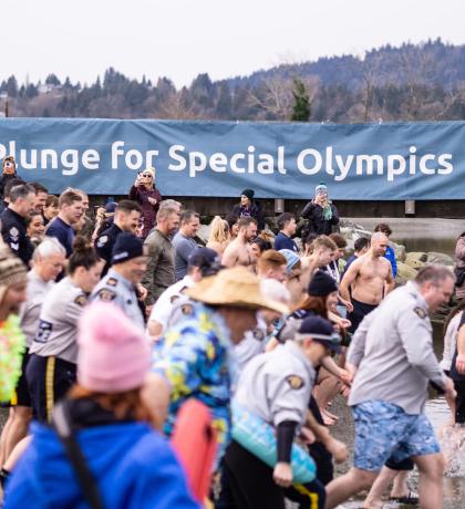 Plungers running into chilly waters