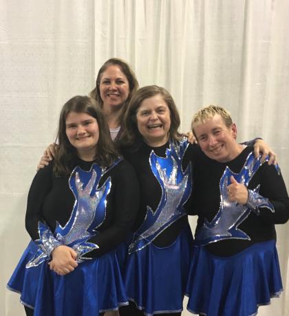 Jennifer Fyfe with three of her rhythmic gymnastics athletes