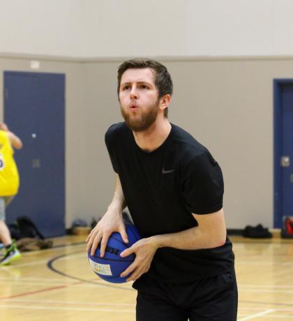 Malachy shooting a basketball