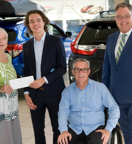 New Car Dealers Foundation group photo of four people